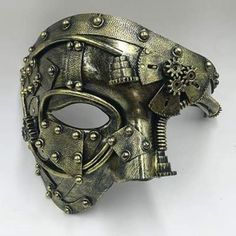 A Steampunk Half Mask on the theme of the Phantom of the Opera. In a steampunk uchrony the opera songs would be replaced by a more modern and noisy style! Item type: Steampunk mask Gender: Unisex Material: Plastic Special use: Cosplay & Steampunk costume Explore the Steampunk masks collection and choose your look: plague doctor, dieselpunk soldier, majestic Venetian, gothic nobleman or post-apo punk. Create an original costume without any limits! Help yourself with other Steampunk accessories to Punk Costume Halloween, Phantom Masquerade, Phantom Mask, Punk Costume, Mask Ball, Action Figures Anime, Steampunk Mask, Halloween Party Costume, Halloween Party Props