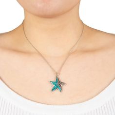 This turquoise filigree starfish pendant necklace offers beautiful seaside style. FEATURES Pendant size: 1.3"L x 1.0"W Chain length: 16 in. + 2-in. extender Chain type: rope Clasp: lobster-claw Metal: sterling silver Plating: sterling silver Finish: oxidized, polished Nickel freeSTONE DETAILS Stone type: turquoise Center stone size: 12 mm Shape: free form Setting: inlay Size: 16". Color: White. Gender: female. Age Group: adult. Turquoise Necklaces With Starfish Charm For Beach, Turquoise Necklace With Starfish Charm For Beach, Beach Turquoise Necklace With Starfish Charm, Bohemian Turquoise Starfish Jewelry, Bohemian Starfish Necklaces With Lobster Clasp, Bohemian Starfish-shaped Turquoise Jewelry, Turquoise Ocean-inspired Necklace With Lobster Clasp, Ocean-inspired Turquoise Necklace With Lobster Clasp, Turquoise Necklace With Lobster Clasp In Beach Style