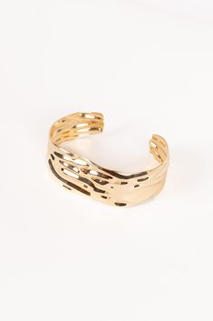 DETAILS   elevate your style with the Landon Bracelet. This stunning gold cuff features a unique textured design that catches the light beautifully, adding a touch of sophistication to any outfit.   gold cuff  textured design  material - 100% alloy    MEASUREMENTS    length - 6.5" Gold Cuffs, Textured Design, Texture Design, Elevate Your Style, The Light, Your Style, Gold Bracelet, Cuff, Bracelet