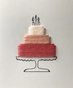 a piece of cake with candles on top is shown in the shape of a card