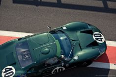 an overhead view of a green race car