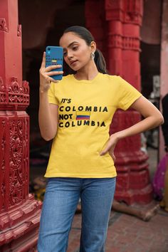 "These Unisex Heavy Cotton Tees with the \"It's Colombia not Columbia\" design are a great way to spice up any outfit. Made of 100% heavy cotton and available in a variety of colors. Features: - 100% preshrunk cotton (fabrication may be different for certain colors) - Classic fit - Fabric weight: 5.3 oz/yd² (180 g/m²) - Taped neck and shoulders for stability and stretch resistance - Tear away label Care Instructions: - Wash in warm water, max 40C or 105F. - Use non-chlorine bleach only when necessary. - Do not dry clean. - Do not iron. - Tumble Dry Medium. This product is made especially for you as soon as you place an order, which is why it takes us a bit longer to deliver it to you. Making products on demand instead of in bulk helps reduce overproduction, so thank you for making thoughtf Yellow Letter Print T-shirt For Fan Merchandise, Yellow Crew Neck Top With Funny Text, Yellow Crew Neck T-shirt With Funny Text, Yellow Graphic Tee With Funny Text, Colombia Flag, Funny Shirt, Spice Up, Santa Fe, Warm Water