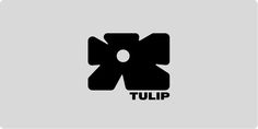 the tulip logo is shown in black on a gray background, and it appears to be an elephant's tail