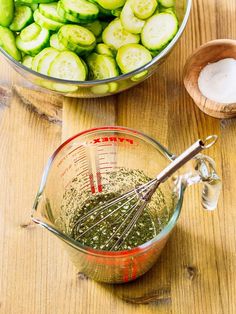 cucumbers and other ingredients in a measuring cup