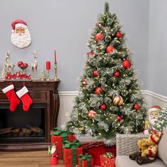 a living room decorated for christmas with presents