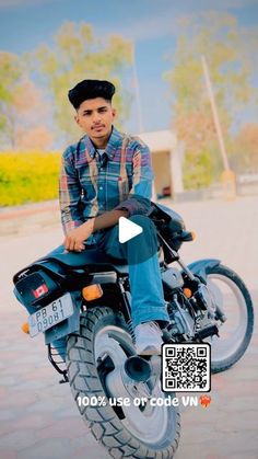 a man sitting on top of a motorcycle with the caption's video below it