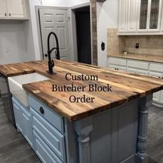 a kitchen island made out of butcher block with the words custom butcher block order on it