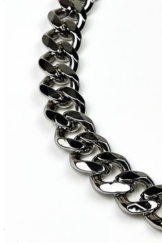 Our founder's favorite go-to necklace. Made from a silver ultra-chunky aluminum curb-link chain that is lightweight, yet durable. An aluminum self-closing O-clasp provides easy on/off functionality. SM-MED: 15.5" in circumferenceMED-LRG: 17" in circumferenceModel is wearing a SM-MED. While our chain will not tarnish, we recommend keeping your jewelry out of water/liquids to preserve the original luster. Made by hand in Pittsburgh, PA. Silver Chunky Cuban Link Jewelry, Silver Cuban Link Necklace With Chunky Chain, Silver Metal Cuban Link Necklace, Silver Necklace With Chunky Cuban Link Chain, Silver Chunky Chain Necklace In Stainless Steel, Silver Stainless Steel Chunky Chain Necklace, Silver Chunky Chain Link Necklaces, Modern Silver Cuban Link Necklace With Chunky Chain, Silver Chunky Link Chain Necklace