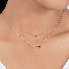 This dainty Garnet station necklace is perfect for everyday wear. Bezel set in solid 14k gold, available in 2 sizes, and adjustable at 2 lengths... the ultimate January birthstone necklace. Stone: Garnet Size: 3MM or 4MM 14k Solid Yellow Gold Diamond Cleaner, January Birthstone Necklace, Necklace Stone, Garnet Necklace, Garnet Jewelry, January Birthstone, Garnet Stone, Station Necklace, Jewelry Inspo