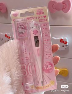 a pink hello kitty pen in its packaging