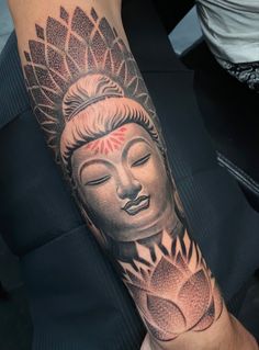 a person with a tattoo on their arm