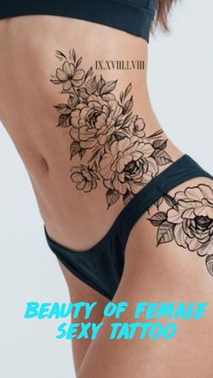 the back of a woman's stomach with flowers tattooed on her lower half and side