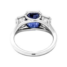 Inspired by modern influence and graphic lines , this Sapphire 3 stone ring will steal your heard with it`s beauty! Delicate, yet bold mounted in Platinum with 3.31ct Radiant Shape Sapphire and side stones emerald cut diamonds totaling 1.25ct G-H color and VS1 clarity. Center stone details: Weight: 3.31 carats Measurements: 9.09 x 6.84 x 5.77 mm Shape: Octagonal Transparency: Transparent Color: Blue Species: Natural Corundum Variety: Sapphire 3 Stone Ring, 45th Birthday, 3 Stone Rings, Blue Sapphire Rings, Emerald Cut Diamonds, Stone Ring, Emerald Cut, Stone Rings, Sapphire Ring