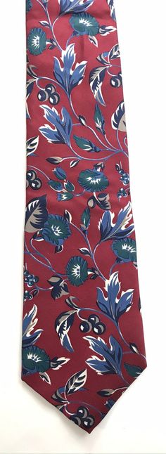 "-Description- >Bert Pulitzer red & blue floral tie >perfect for spring/summer! >condition: great >color(s): red, blue, white >fabric(s): 100% silk >brand: bert pulitzer -Measurements- ✩ all measurements are taken with the item laying flat & some sizes are estimates so please check measurements ✩ width: 3.5\" / 9cm length: 57\" / 145cm -social media- instagram: @voguevibesvintage T#2 VVV1914" Red Formal Ties For Spring, Elegant Red Spring Tie, Red Tie For Spring Formal Occasions, Elegant Red Ties For Spring, Elegant Red Spring Ties, Red Ties For Spring Formal Occasions, Classic Floral Print Summer Tie, Classic Floral Print Ties For Summer, Classic Red Ties For Summer