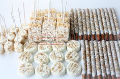 marshmallows and other treats are arranged on sticks