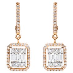 18 Karat Gold 0.89 Carat Diamond Dangle Drop Earrings This fantastic invisible set emerald cut diamond long hanging earring is classic. The invisible diamond emerald cut in white gold setting is a crafty design wherein 4 smaller baguette-cut diamonds in the center, 4 round diamonds on either sides, carefully combine to shape together an illusion of a larger diamond emerald cut shape. The surrounding slightly gaped single row pave diamond cluster in rose gold makes the stud more intriguing and ma Hanging Earring, Emerald Cut Diamond, Baguette Cut Diamond, The Invisible, Hanging Earrings, Diamond Drop Earrings, Emerald Cut Diamonds, Diamond Cluster, Diamond Solitaire