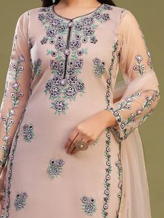 Introducing our mesmerizing peach embroidered net traditional pantsuit with dupatta, the perfect ensemble for all your special occasions. Made with high-quality peach color net material, this suit features intricate multi-thread embroidered work that adds a touch of elegance and sophistication to your look.
The peach suit is semi-stitched up to 56 inches, allowing for a perfect fit for a wide range of body types.  The suit comes with a 2.25-meter-long dupatta made from similar color net mat Festive Peach Unstitched Suit With Resham Embroidery, Peach Anarkali Unstitched Suit With Resham Embroidery, Peach Anarkali Unstitched Suit For Eid, Peach Resham Embroidery Sets For Eid, Peach Sets With Resham Embroidery For Eid, Peach Unstitched Suit With Resham Embroidery, Peach Unstitched Suit For Eid, Embroidered Unstitched Net Salwar Kameez, Peach Palazzo Set With Resham Embroidery For Eid