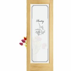 an empty wooden frame with flowers on it