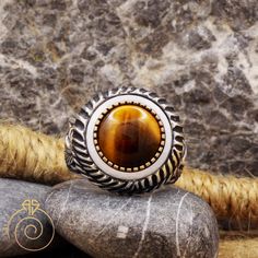 "Huge imperial quilted turban design natural stone tiger eye sultan silhouette ring. Conquest is Conqueror's an exclusive handmade emperor mens tiger's eye gemstone signet ring carved Sultan Fatih Sultan Mehmet silhouette. A symbol of imperial Ottoman style. Antique ancient ring who loves history and jewelry. Perfect gift for a leadership, Turkish and Muslim Mens All sizes are avaliable. If you have extra big size (out of cart) please ask avaliability. One of high quality handmade silver ring fr Luxury Rings With Natural Stones, Elegant Brown Rings With Natural Stones, Artisan Brown Gemstone Rings, Mens Ruby Ring, Ottoman Styling, Tiger Eye Gemstone, Brown Stone, Tigers Eye Gemstone, Silver Chain Bracelet