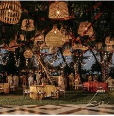 an outdoor party with lights and decorations