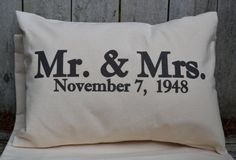 a white pillow with black lettering on it that says mr and mrs november 7, 1940