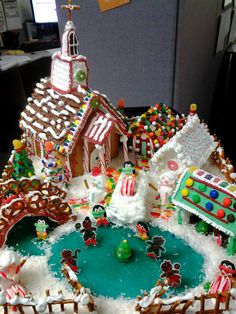 an elaborate gingerbread house is decorated with candy