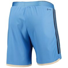 Whether you're honing your skills or hanging around the house, these spirited adidas shorts are just what you need to stay comfortable. These stylish bottoms feature embroidered team graphics and an authentic design to get you looking like a proper Philadelphia Union fan. AEROREADY fabric wicks away moisture, which helps keep you cool and dry while you cheer Philadelphia Union to victory.Whether you're honing your skills or hanging around the house, these spirited adidas shorts are just what you Adidas Logo Shorts For Sports Events, Blue Adidas Bottoms With Logo, Blue Athletic Shorts With Three Stripes For Sports, Adidas Logo Sports Shorts, Adidas Moisture-wicking Shorts, Blue Training Bottoms With Three Stripes, Adidas Blue Gym Shorts, Adidas Blue Shorts For The Gym, Adidas Blue Shorts For Gym