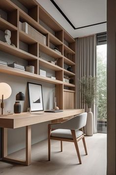 a home office with wooden shelves and white chairs