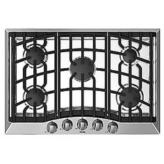 an oven with four burners and three knobs