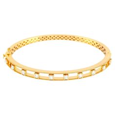 This lovely oval shape diamond 18K yellow gold bangle is open-able on side with open box clasp with safety locks on side. This is a very fine bangle to stack with your favorite bangles. 18Kt: 18.116g Diamond: 0.82Ct Bangle With Diamonds, Yellow Gold Bangle, Box Clasp, Gold Bangle, Open Box, Gold Bangles, Oval Shape, Bangle Bracelets, Jewelry Bracelets