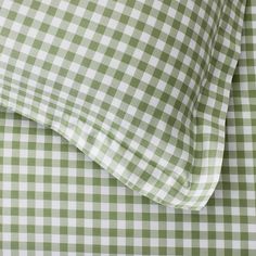 the green and white checkered sheets are neatly folded