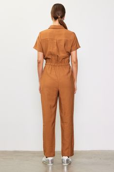 If you need an outfit that will have you ready in 30 seconds, opt for this utility jumpsuit. It's basically effortless, designed with short sleeves, multiple pockets, and a drawstring waist to define the shape. •Pointed collar •Buttoned half placket •Utility pockets •Elasticized waist •Adjustable drawstring Item Number: 74374 Ginger Brown, Short Sleeve Jumpsuit, Utility Jumpsuit, Short Sleeve Jumpsuits, Utility Pockets, Jumpsuit With Sleeves, 30 Seconds, Item Number, Drawstring Waist