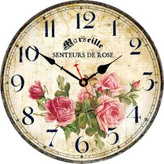 a clock with pink roses painted on it's face and the words senteurs de rose written in french