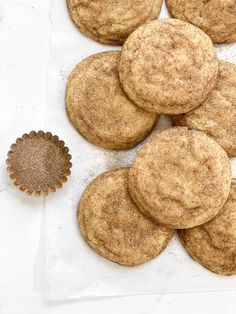 a pile of cookies sitting on top of a white table