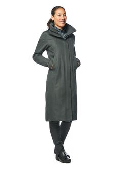 This coat is coveted by trainers, riders, and anyone who spends time in the elements with horses. The durable, abrasion resistant HydroTek™ fabric is seam sealed, windproof, and waterproof to insulate from any weather. A tall collar pops up for wind protection and features a stowable hood. In-saddle performance is provided by internal leg straps which hold the coat in place while riding, with a split back gusset that opens to cover your saddle when mounted, and magnets to keep it closed on the g Fitted Raincoat For Rainy Fall Weather, Fitted Waterproof Raincoat For Fall, Fitted Raincoat For Winter Rainy Weather, Fitted Raincoat For Rainy Winter Weather, Winter Long Fitted Raincoat, Fitted Hooded Raincoat For Fall, Fitted Winter Travel Outerwear, Fitted Outerwear For Travel In Fall, Equestrian Apparel