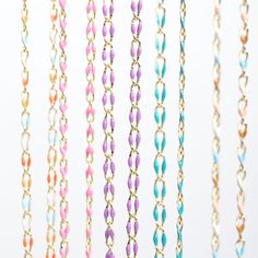 “The Topanga” is made of 14kt gold fill chain dotted with colorful enamel coating, to add some dreamhouse color to your jewelry mix. Comes in several tropical tones: Turquoise Surf, Sunset Pink, Black Sands, Palest Sky Blue, White Sands, Multi Sands, Multi Suns, and Lavender Skies. They are the perfect subtle pop of color to refresh your jewelry collection. Select the perfect length to suit your style! Details: Length of your choice Chain is 14kt gold fill with colored enamel coating 14kt gold fill lobster clasp and closure Handcrafted in Los Angeles, California, USA Multicolor Enamel Charm Necklaces, Multicolor Enamel Jewelry With Lobster Clasp, Multicolor Link Jewelry With Adjustable Chain, Multicolor Dainty Jewelry With Delicate Chain, Colorful Chain Jewelry As Gift, Colorful Chain Necklace For Gifts, Colorful Chain Jewelry For Gifts, Multicolor Beaded Chain Necklace, Earrings Quotes