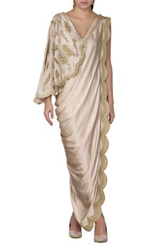 Shop for these amazing collections of Gold Satin V-shaped Neckline Pre-draped Saree Dress For Women by Limerick by Abirr N' Nanki online at Aza Fashions. Draped Saree Gown, Gowns Gold, Panelled Dress, Saree Gowns, Drape Sarees, Gown For Women, Saree Gown, Drape Saree