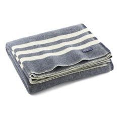 two blue and white striped towels folded on top of each other, with one folded over the