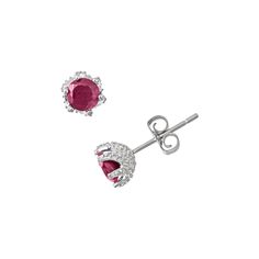 Dazzle them. Round-cut ruby stones give these stud earrings a captivating glow. You'll be the center of attention every time you wear these sterling silver studs. Studded details accent the sides of the six-prong settings. Earrings come in a gift box. Details: 7-mm diameter Pierced Post backings Rhodium-plated sterling silver Size: One Size. Gender: female. Age Group: adult. Ruby Earrings With Prong Setting And Round Cut, Ruby Earrings With Round Cut And Prong Setting, Ruby Earrings With Prong Setting In Round Cut, Silver Lab-created Ruby Earrings For Anniversary, Silver Earrings With Lab-created Ruby For Anniversary, Silver Earrings With Lab-created Ruby In Fine Jewelry Style, Silver Earrings With Lab-created Ruby, Silver Anniversary Earrings With Lab-created Ruby, Anniversary Silver Earrings With Lab-created Ruby