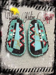 two pairs of native beaded earrings with turquoise and red beads on the bottom, one is