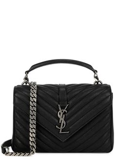 Find SAINT LAURENT College Medium Leather Shoulder Bag on Editorialist. The Saint Laurent College bag is crafted from quilted matelassé leather. The front features the house's signature logo plaque. This versatile bag can be suspended from the matching chain shoulder strap or carried by the top handle. It also has a back slip pocket, internal zip-fastening compartment, patch pocket, and is fully lined. It has a concealed magnetic press-stud fastening at the front flap. The bag measures 9.25 inches in width, 6 inches in height, and 2.5 inches in depth. The top handle has a 2.5 inch drop and the shoulder strap drop is 22.5 inches. Luxury Quilted Leather Flap Bag, Luxury Quilted Flap Bag With Top Handle, Luxury Quilted Top Handle Flap Bag, Designer Quilted Leather Flap Bag, Saint Laurent College Bag, College Bags, Bag Chain, Stocking Fillers, Press Studs