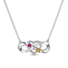 On Mom's special day, surprise her with this darling gemstone necklace. Crafted in the metal of your choosing, this look features an infinity symbol-shaped ribbon artfully intertwined with a heart-shaped design. Add a personalized touch with the three to seven gemstones you select. Buffed to a brilliant luster, this choice suspends centered along an 18.0-inch box chain in sterling silver or a 17.0-inch curb chain in gold that secures with a spring-ring clasp. Sterling Silver Infinity Heart Necklace For Anniversary, Elegant Heart Necklace With Birthstone For Birthday, Elegant Birthstone Heart Necklace For Birthday, Silver Infinity Heart Necklace For Anniversary, Elegant Open Heart Birthday Jewelry, Sterling Silver Birthstone Necklace With Adjustable Chain For Anniversary, Elegant Adjustable Birthstone Necklace For Anniversary, White Infinity Necklace For Anniversary, Elegant Infinity Necklaces For Birthday