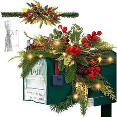 a mailbox decorated with christmas decorations and lights