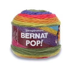 yarn ball with the words bernat pop in white and multicolors on it