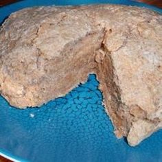 two large rocks sitting on top of a blue plate