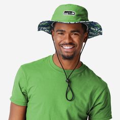 Sun-sational style is coming your way! Make sure you're the coolest fan at the tailgate, beach, or ballgame in this Seattle Seahawks Solid Hybrid Boonie Hat! Features All-over, team-colored design so you can rep the team in style Embroidered team logo display, in case there were any doubts where your allegiances lie Adjustable black lace chin string for a comfortable wear Top vent eyelets for optimal air flow and comfort Team-colored, tropical design with repeat team logo display on panel under Sports Fan Hats For Sports Events, Casual Team-colored Hats For Fans, Team-colored Sports Fan Hat For Fan Gear, Sports Fan Team-colored Hat For Fan Gear, Team-colored Sports Fan Hat, Sports Fan Hat With Team Logo, Boonie Hat, Outdoor Hat, Logo Display