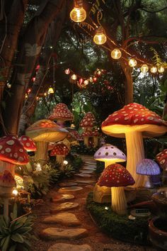 many mushrooms are lit up in the forest by lights and fairy lights hanging from trees