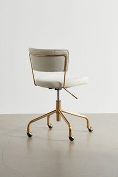 an office chair with wheels and a white upholstered seat, viewed from the front