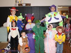 a group of people in costume standing next to each other