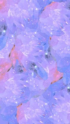 an abstract background with blue, pink and purple crystals in the shape of stars or snow flakes